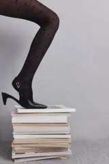 Medias can can negras con cintura elástica y estampado de moñas.
