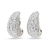 Aros de clip Swarovski Sublima con baño de rodio y cristales transparentes engastados en pavé. Diseño abovedado con patrón Meteora de cristales de distintos tamaños.