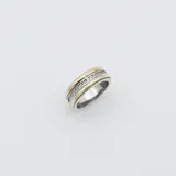 Anillo medio sin fin de plata 925 con detalles en oro y circonias.