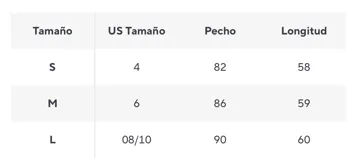 Chaleco tejido color gris con cuello alto y flecos.