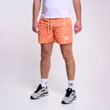 Short de baño estampado color durazno, con cintura elástica y cordón.
