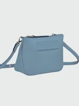 Bandolera Longchamp modelo 3D XS, color celeste.