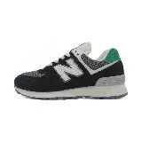 Zapatillas New Balance 574, color negro con detalles en gris, blanco y verde. Confeccionadas en gamuza y malla, con logo "N" característico en los laterales y entresuela ENCAP.