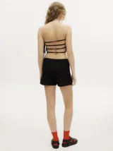 Short tejido a crochet color verde azulado, con cintura elastizada.