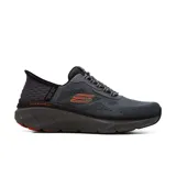 Championes deportivos Skechers Slip-Ins Relaxed Fit D'Lux Walker 2.0 Rezinate, color gris con detalles en naranja. Diseñados con tecnología Heel Pillow y plantilla Skechers Air-Cooled Memory Foam.
