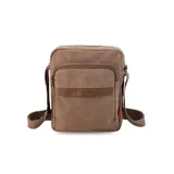 Morral bandolera negro de tela canvas con correa regulable. Tiene apertura superior con cierre, bolsillo frontal con cierre, bolsillos internos y bolsillo trasero con cierre.