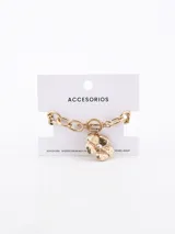 Pulsera dorada de eslabones gruesos con dije de flor con una perla en el centro.