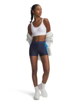 Calza corta deportiva Under Armour HeatGear Rib Shorty, de tiro alto, color azul marino con paneles laterales en azul eléctrico y cintura elástica con logo de la marca. Confeccionada en tejido transpirable y absorbente del sudor con paneles elásticos acanalados.