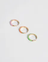 Set de tres anillos finos de cobre, en colores rosa, naranja y verde, con detalles de strass.