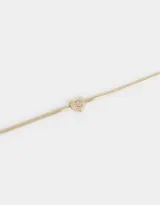 Pulsera dorada de cadena cola de ratón con dije de corazón adornado con strass y cierre de mosquetón.