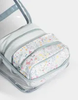 Neceser transparente con estampado floral, con manija superior y doble cierre.