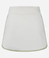 Short pollera deportivo de microfibra color blanco hueso, con cintura alta y bies contrastante en el ruedo.