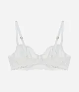 Soutien de encaje blanco con aro, sin copa, de corte balconette. Presenta breteles finos ajustables y terminaciones festoneadas en el escote y el bajo.