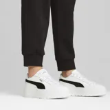 Championes Puma Karmen II L, color blanco con detalles en negro, plataforma alta y logo de Puma en el lateral.