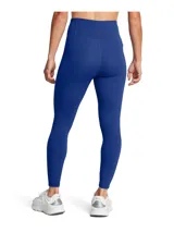 Calza deportiva Under Armour Motion Ankle Leg color azul con pretina alta, logo estampado en la cadera y bolsillo lateral.