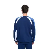 Buzo azul marino de algodón con recortes en blanco y celeste en mangas y hombros. Logo de Umbro bordado en blanco y escudo del Club Nacional de Football estampado en el pecho.