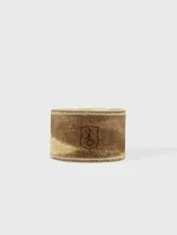 Posa mate cilíndrico de cuero crudo con costuras decorativas y logo grabado.