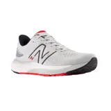Championes de running New Balance modelo Fresh Foam X 880v12, color azul con detalles en gris, blanco y verde.