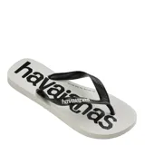 Sandalias Havaianas Top Logomania, base blanca con logo negro y tiras negras texturizadas.