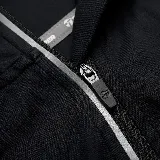 Camiseta deportiva Topper de manga larga, color negro, con cuello alto con cierre de cremallera frontal y logo estampado en el pecho.