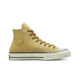 Championes de caña alta Converse Chuck 70, color amarillo ocre con cordones marrones.