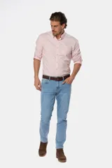 Pantalón de jean negro de corte skinny con tiro medio.