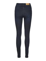 Jeans skinny de tiro alto en denim azul oscuro elastizado, con cinco bolsillos, cierre frontal con cremallera y botón.