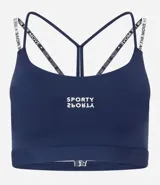 Top deportivo azul marino con copas, breteles finos cruzados en la espalda con lettering "ON THE MOVE" y aberturas decorativas en la espalda.