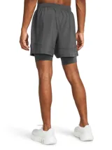 Short de running Under Armour Launch 5 2N1, color negro con logo blanco.