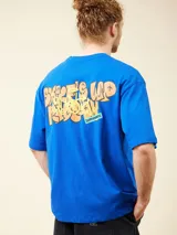 T-Shirt azul de corte amplio y cómodo, fabricada en 100% algodón.