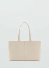 Bolso tipo tote color beige, con doble asa corta y asa de hombro.