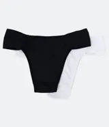 Kit de dos bombachas de bikini sin costuras, confeccionadas en microfibra, con forro. Incluye una bombacha blanca con laterales fruncidos y una bombacha negra con moño decorativo.