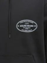 Buzo con capucha y manga larga, fit holgado, color negro. Confeccionado en tejido de punto circular loopback 100% algodón con interior cepillado. Presenta un estampado ovalado en la espalda con texto en blanco que incluye "ESTABLISHED IN COPENHAGEN 1990", "JACK&JONES WORLDWIDE MRK", "ORIGINALS CREATIVE DEPARTMENT DAILY BASICS" y "FROM VISION TO REALITY".