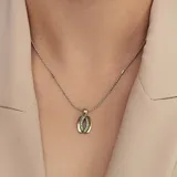 Conjunto de collar y dije en plata y oro con circonias engarzadas.