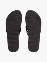 Ojotas Tommy Hilfiger azul marino con tiras de tela trenzada con rayas blancas y suela plana.