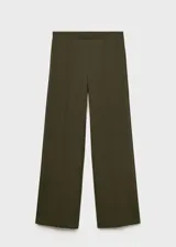 Pantalón de punto color verde militar, de tiro medio y corte recto. Presenta cintura elástica, costuras decorativas frontales y diseño largo.