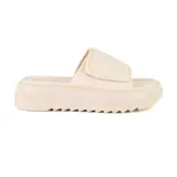 Sandalia casual color beige con plataforma y tira ancha con velcro.