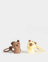 Llavero con forma de oso, disponible en color marrón y amarillo.