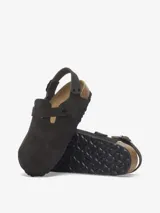 Zueco con tira trasera ajustable, color negro, con plantilla anatómica.