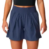Short de mujer Columbia color azul marino, con tecnología de repelencia avanzada Omni-Shield, cintura elástica, bolsillos laterales y bolsillo trasero con cierre de seguridad.