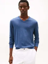 Sweater azul de algodón con cuello en V y logo bordado en el pecho.