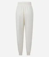 Pantalón jogger color amarillo claro, con cintura elástica y cordón de ajuste. Confeccionado en algodón con forro de polar.