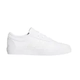 Zapatillas Adidas Adi-Ease blancas de lona con las tres tiras laterales microperforadas.