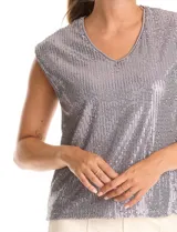 Blusa de lentejuelas color gris, marca Ninety, con escote en V y forro interno a tono. Sin mangas.