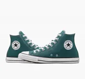 Championes Converse Chuck Taylor All Star de caña alta, color verde azulado, con cordones blancos y suela de goma blanca con línea negra.