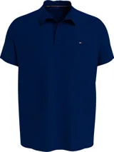 Chomba azul marino de felpa con cuello clásico, corte amplio y logo de Tommy Hilfiger bordado en el pecho.