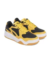Zapatillas urbanas Under Armour U Court Anatomix, con capellada de cuero sintético negro con detalles en amarillo y suela de goma color caramelo. Diseño anatómico para mayor comodidad y control.