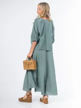 Vestido largo color verde agua, de bambula italiana, con breteles finos y corte suelto.