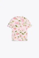 Camiseta de algodón color rosa con estampado de flores.