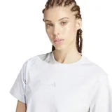 Remera gris jaspeado de algodón con logo pequeño de Adidas estampado en el pecho. Corte clásico y cuello redondo.